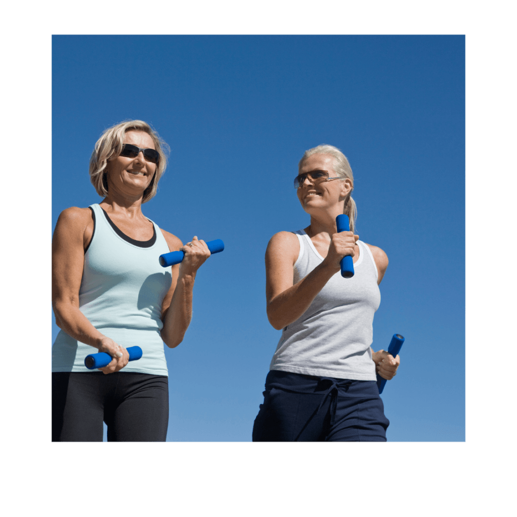 two women walking with weights.